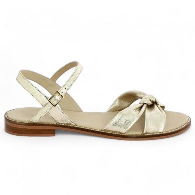 women's large size flat sandal with gold bow, side view