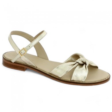 women's large gold bow flat sandals, profile view