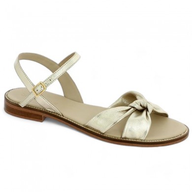 women's large gold bow flat sandals, profile view